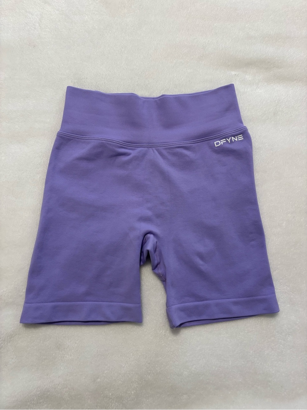 Women’s DFYNE purple gym shorts
size extra small